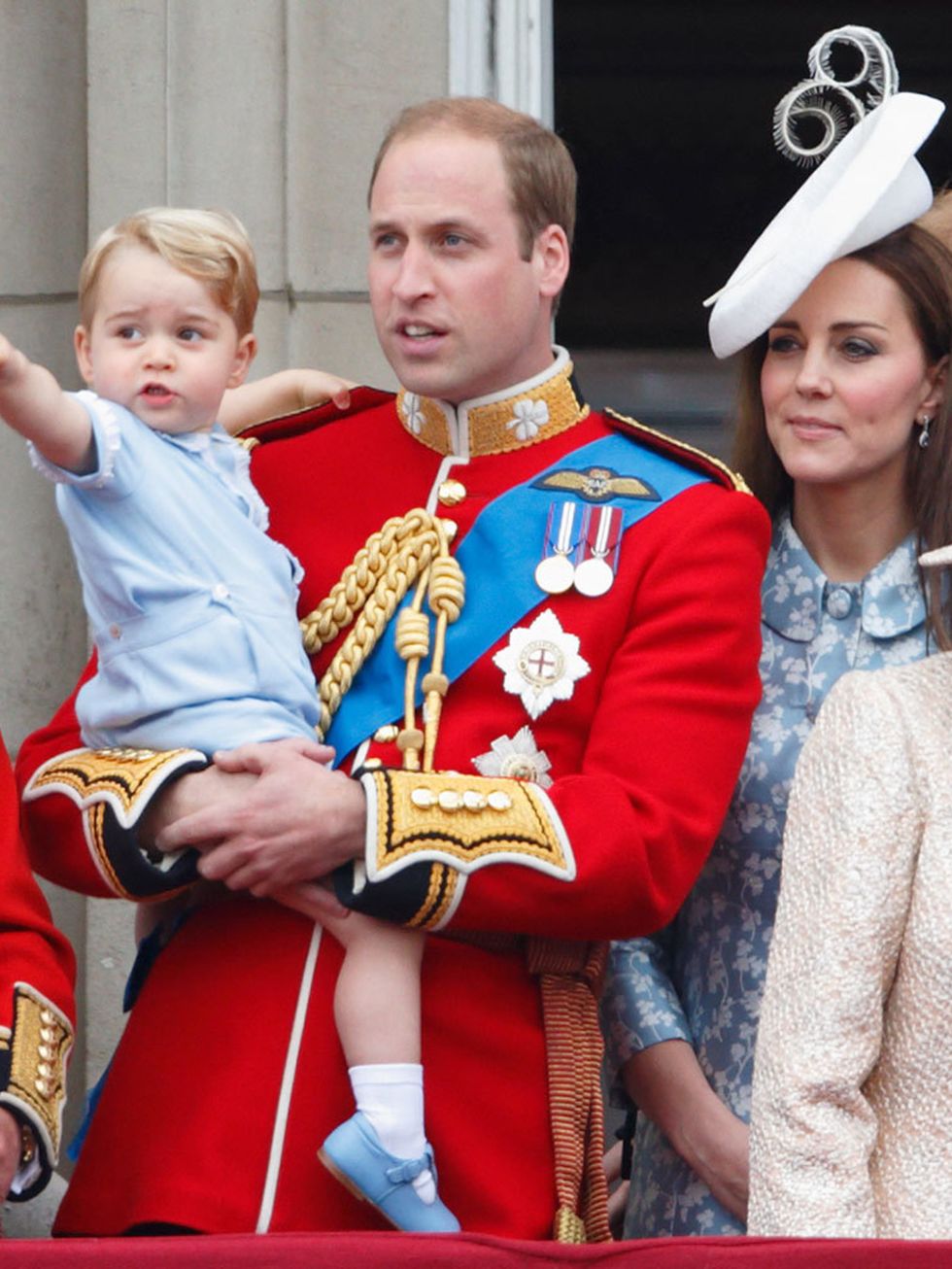 <p>Prince George makes his first appearance on the balcony of Buckingham Palace in a sweet baby blue ensemble in celebration of the Queen&#39;s official birthday, June 2015.</p>
