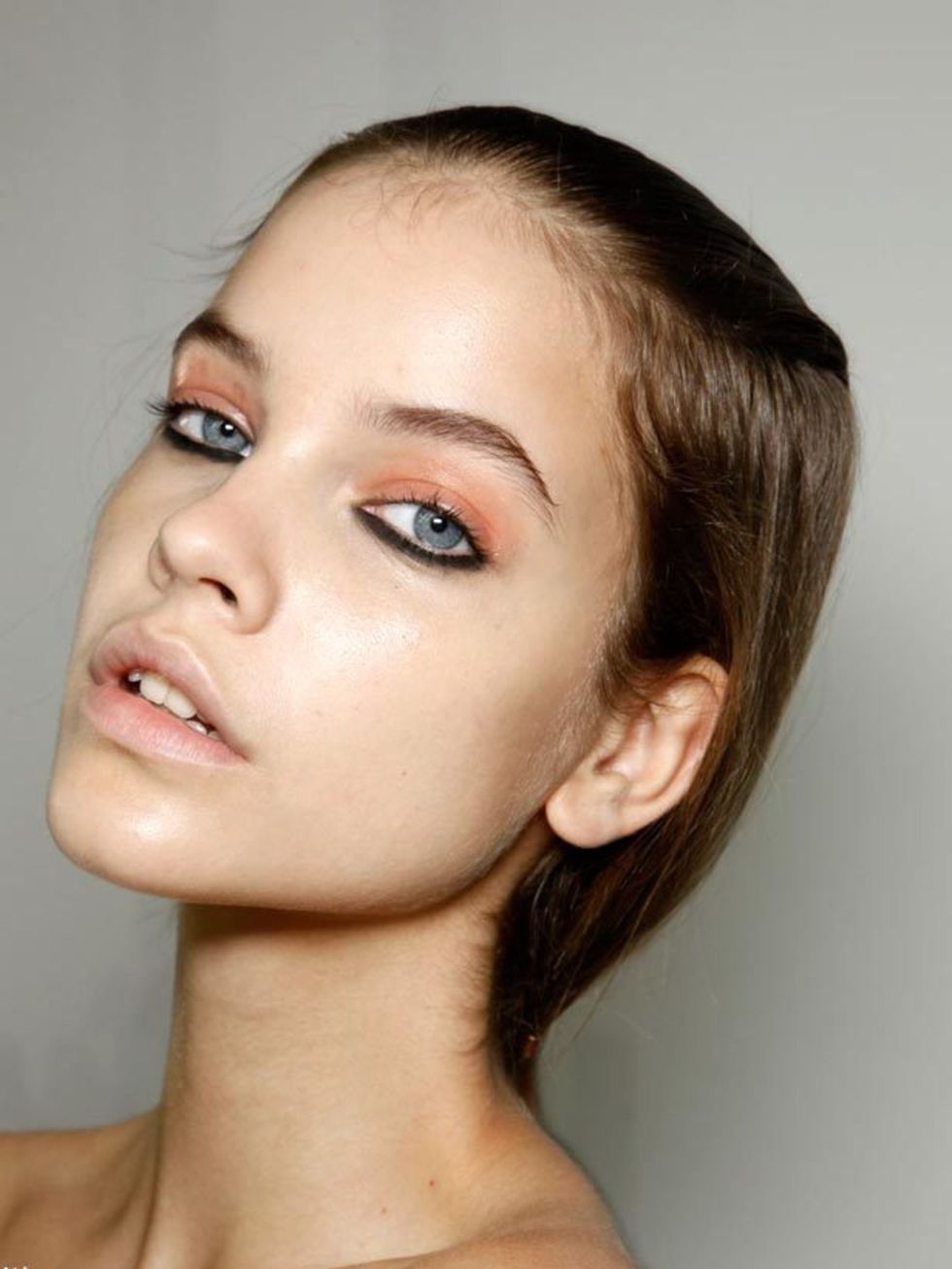 <p>Skin is hyper-real, super dewy perfection for spring/summer. Where make-up artists saved time on omitting mascara, lipstick and blusher from looks, they devoted it to buffing, glossing and generally beautifying models' skin. Andrew Gallimore at Holly F