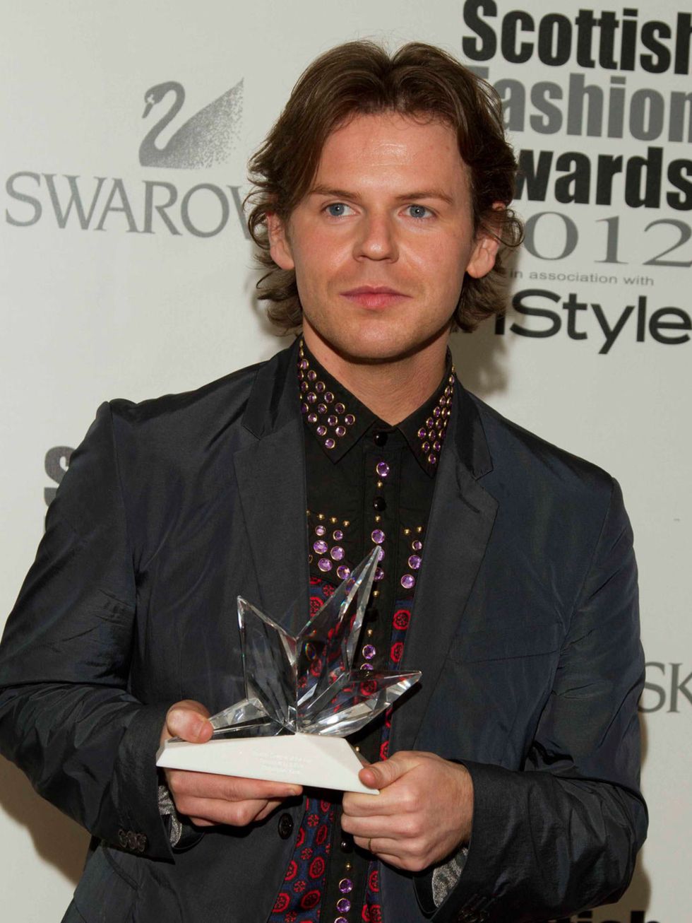 <p>Christopher Kane with his award for Designer of the Year</p>