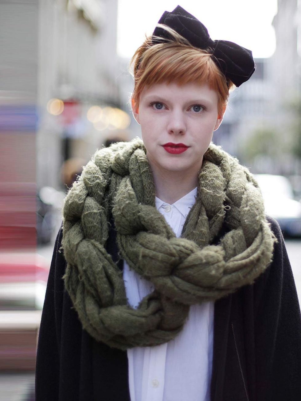 <p>Emma, 23, Hairdresser. Topshop scarf, Cos coat, Religion shirt, H&amp;M headband.</p>