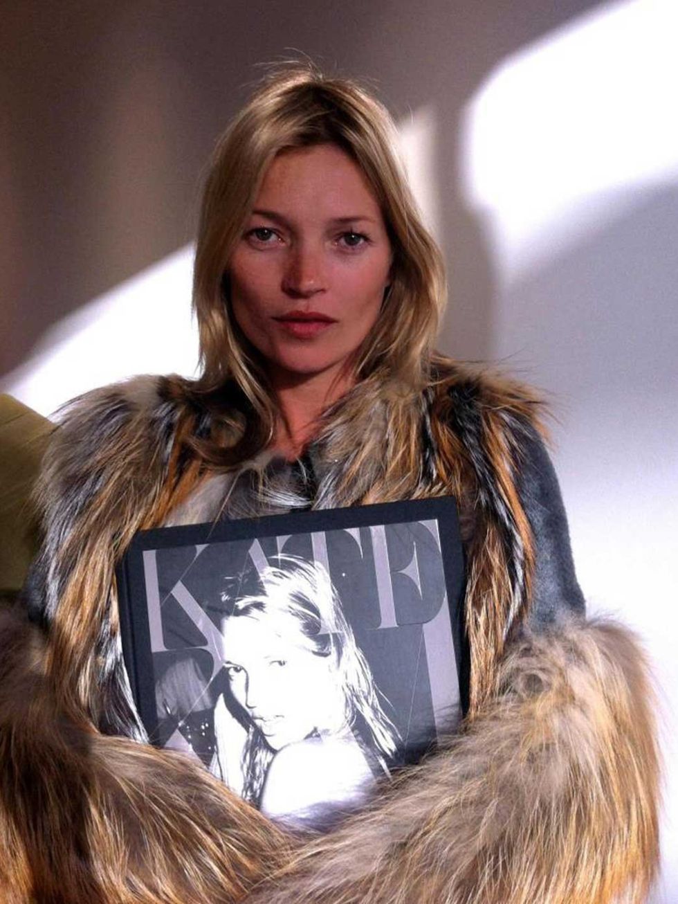 <p>Kate Moss with her book - Kate: The Kate Moss Book</p>