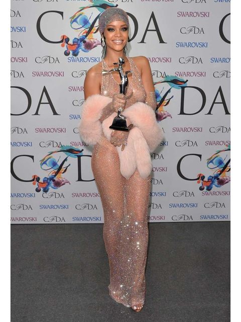 <p><a href="http://www.elleuk.com/star-style/celebrity-style-files/rihanna-s-style-file">Rihanna</a> attends the 2014 CFDA Fashion Awards in a custom-made Adam Selman creation.</p><p><em><a href="http://www.elleuk.com/elle-tv/cover-stars/elle-magazine/rih