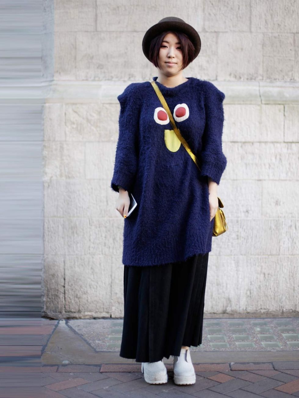 <p>Candy, 20, Student. Mercibeaucoup jumper, vintage skirt and hat, 3.1 Philip Lim bag.</p>