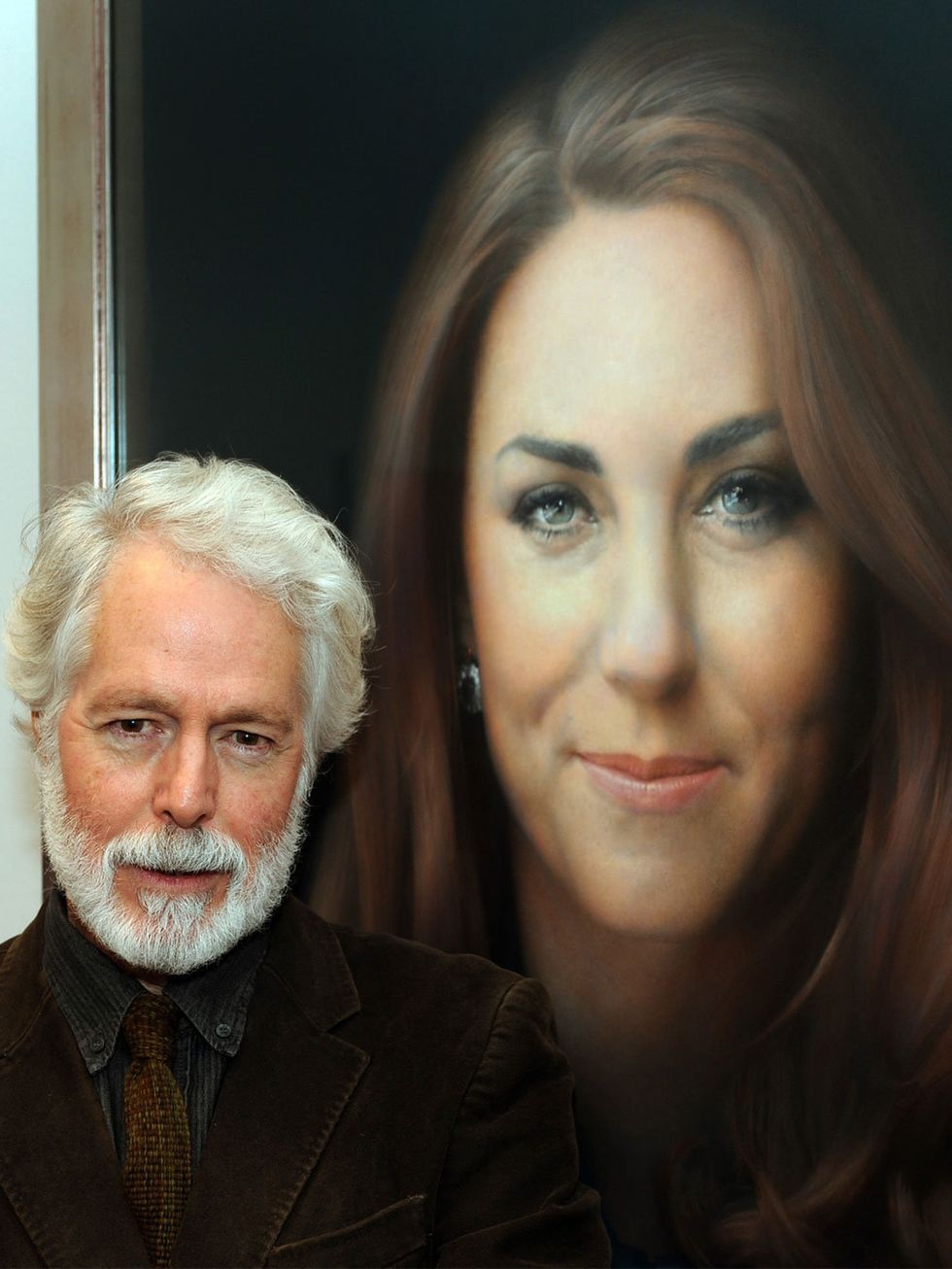 <p>Artist Paul Emsley with Kate Middleton's first official portrait</p>