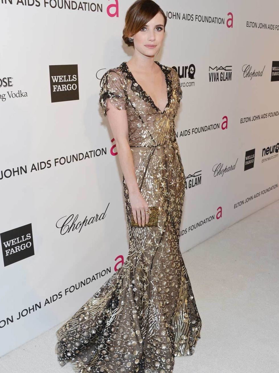 <p>Emma Roberts in <a href="http://www.elleuk.com/catwalk/designer-a-z/oscar-de-la-renta/autumn-winter-2013">Oscar de la Renta</a></p>