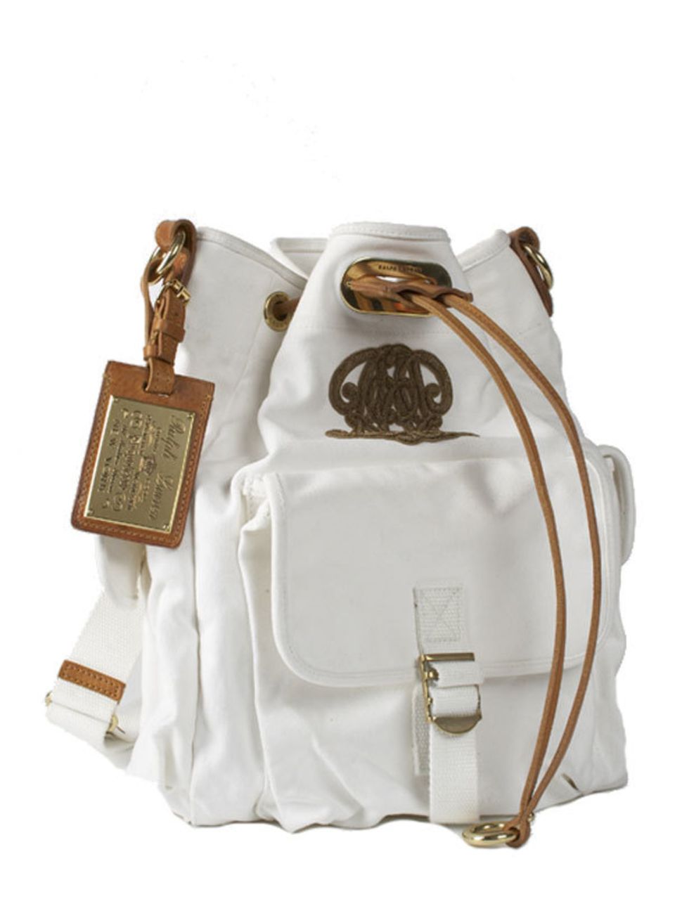 <p>White and tan leather duffle bag, £660, by Ralph Lauren Collection (0207 535 4600)</p>