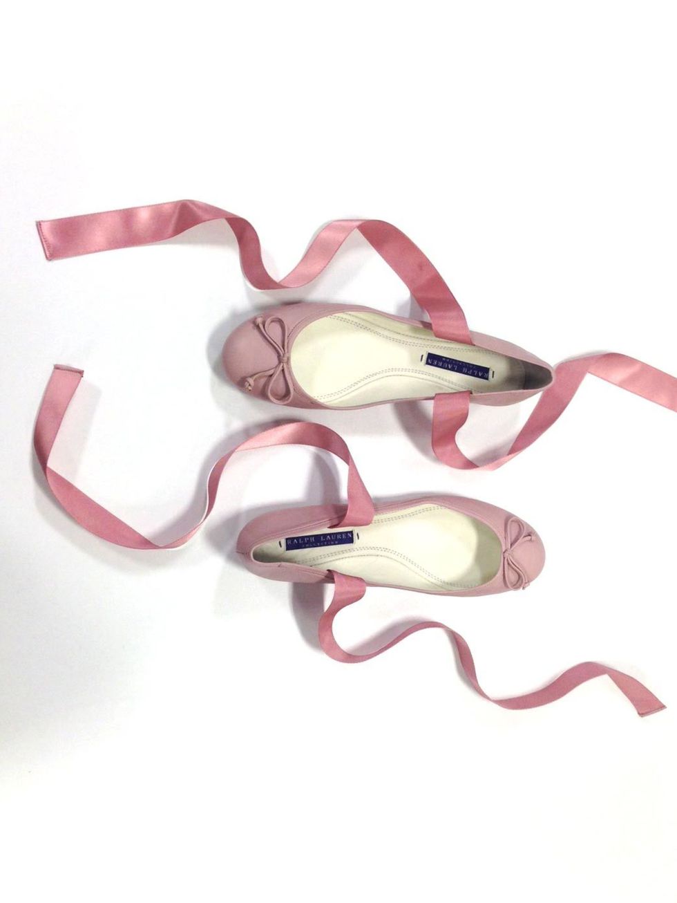 <p>Feel pretty in pink with these ballet pumps by Ralph Lauren.</p><p><a href="http://www.elleuk.com/style/occasions/elle-christmas-gift-guide-fashion-cupboard-luxury-presents">Present Panic? Read our last minute gift guide.</a></p>