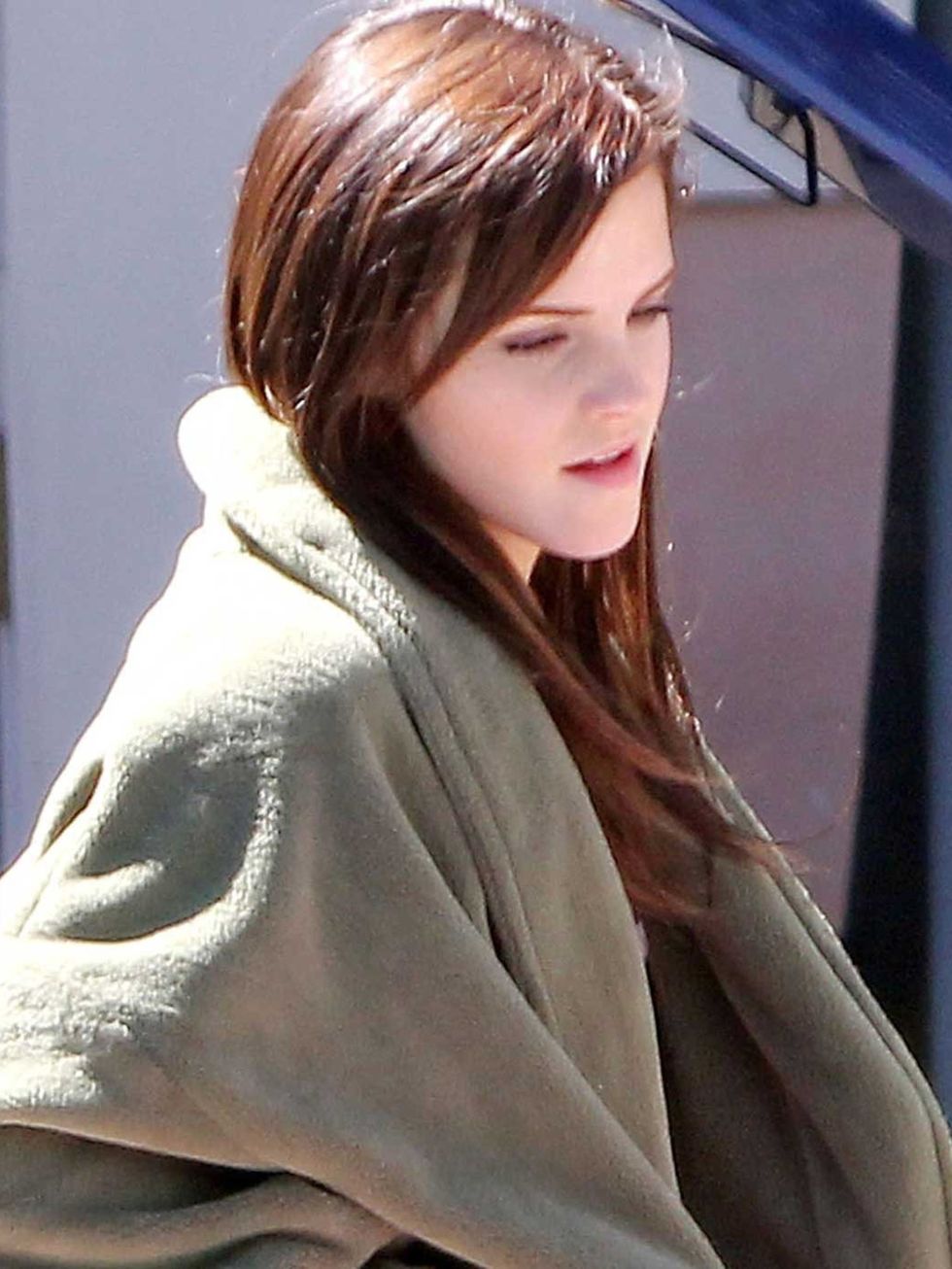 <p>Emma Watson wearing hair extensions on the set of her new film, The Bling Ring</p>