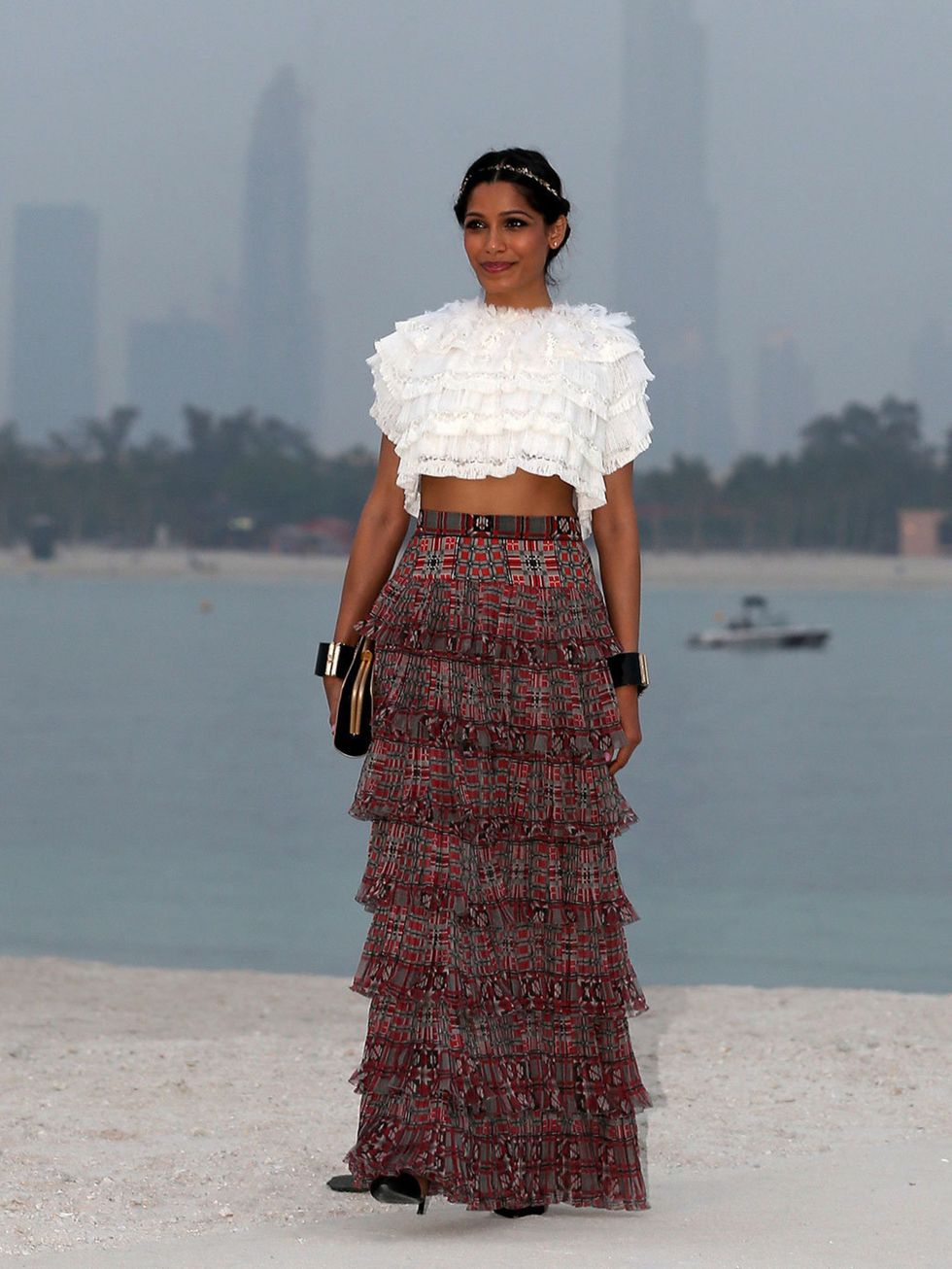<p>Freida Pinto attends the Chanel Cruise Collection 2014/2015 </p>