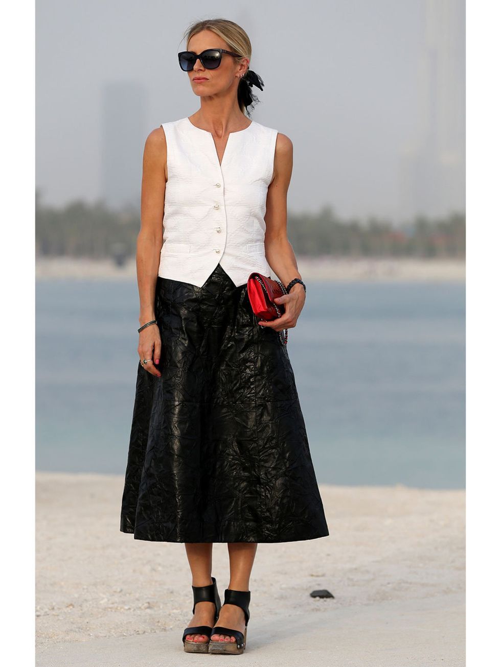 <p>Laura Bailey attends the Chanel Cruise Collection 2014/2015 </p>