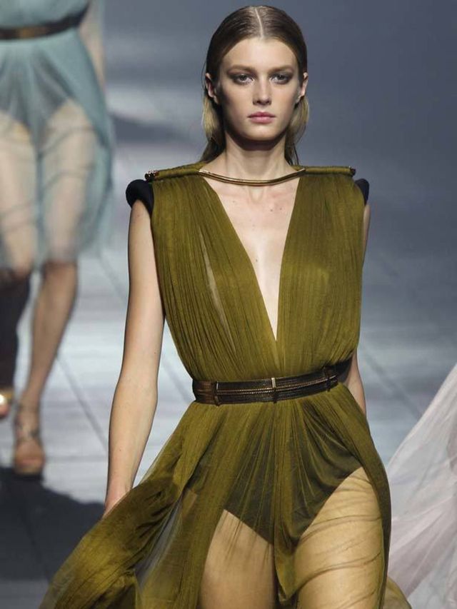 <p>Just how did Elbaz manage to make a snake print slithering across a jumpsuit look so modern?  Or slashed pencil skirts not a bit slutty? With further moves in to separates through loose trouser suits and low cowl back tops, Lanvin and its ability to fl