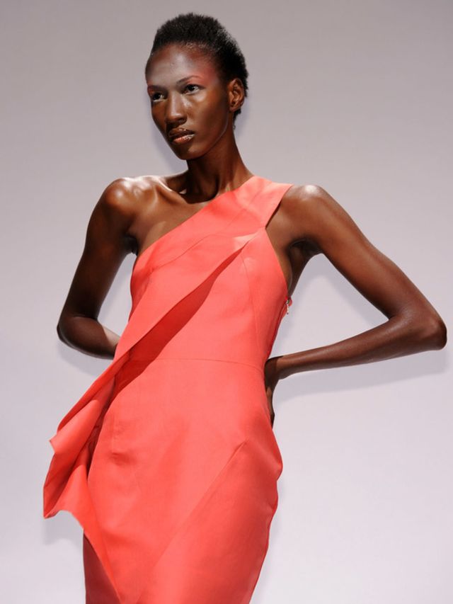 <p>Brit designer William Tempest made his New York debut today with a presentation of his collection entitled The Sirens Song. His draped and structured dresses were still in evidence, with coral boned bandeau pieces with stiff folds and frothy chiffon