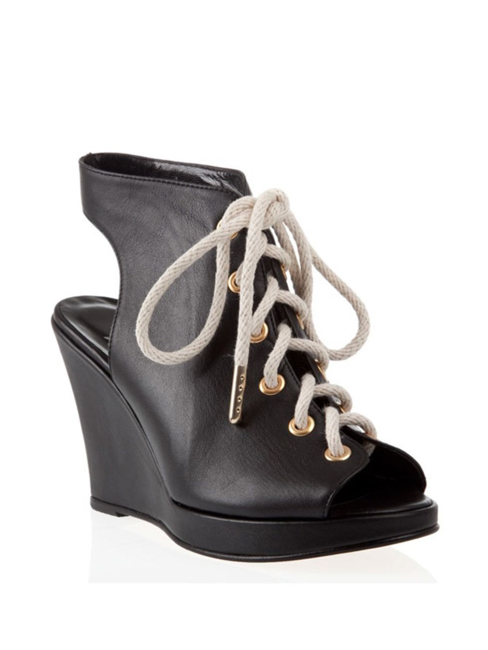 <p>Lace-up wedge sandal, £295, by Opening Ceremony at <a href="http://www.farfetch.com/shopping/women/footwear/item10030192.aspx?storeid=0">Farfetch</a> </p>