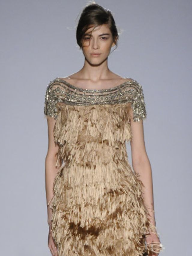 <p>Ferretti is where you should come for your Autumn Winter eveningwear. Romantic olive, nude and powder blue silk dresses with fine pleats lent a 1920s air with drop waists and beaded bands. Oyster dresses had scoop backs and skirts were made from ticker