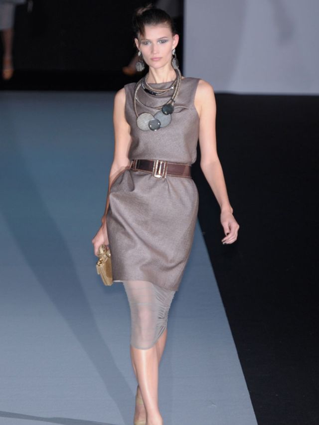 <p>The byword for classic elegance, Armani relaxed his aesthetic by adding transparent jersey pencil skirts and leggings under blousons and bandeau tops. Racer-backs were added to shift dresses, nylon was used on shirts and bright yellow ankle length pant