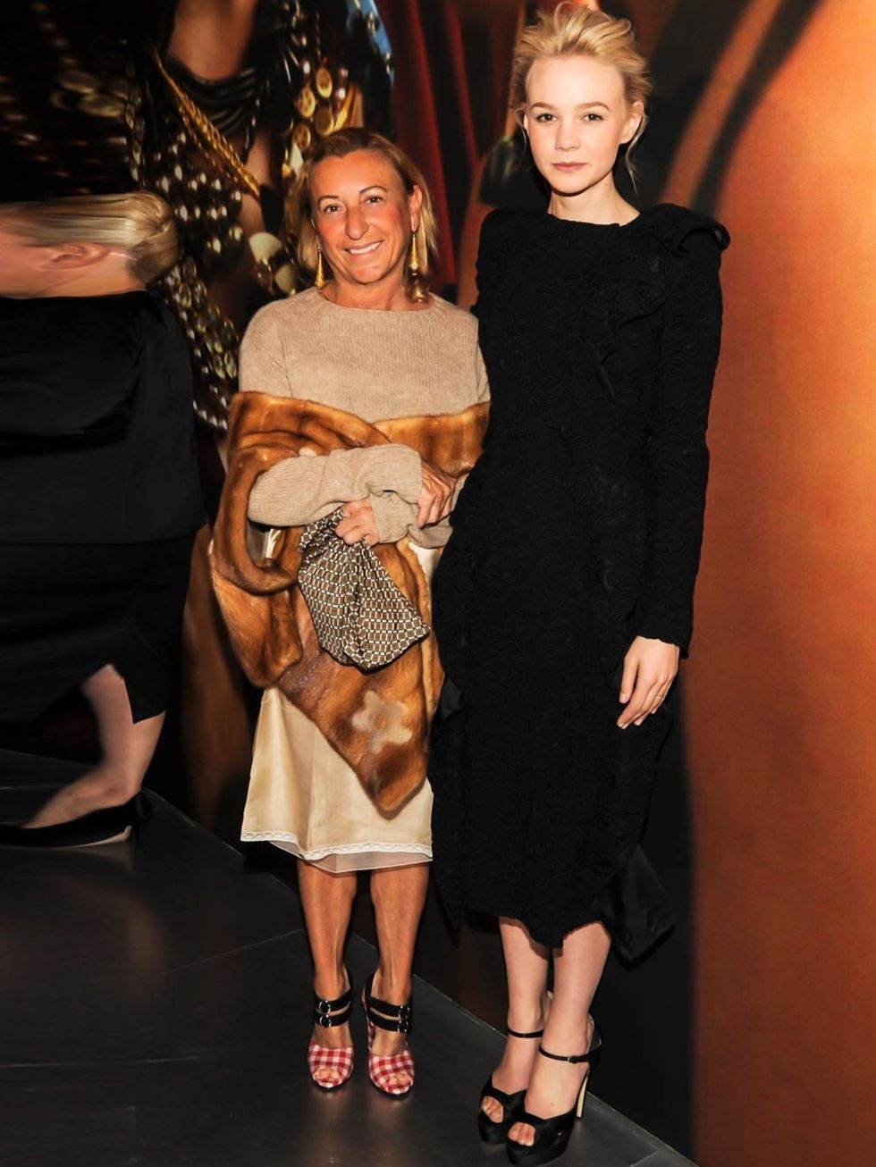 <p><a href="http://www.elleuk.com/star-style/celebrity-style-files/carey-mulligan">Carey Mulligan</a> in a black Prada dress, with Miuccia Prada.</p>
