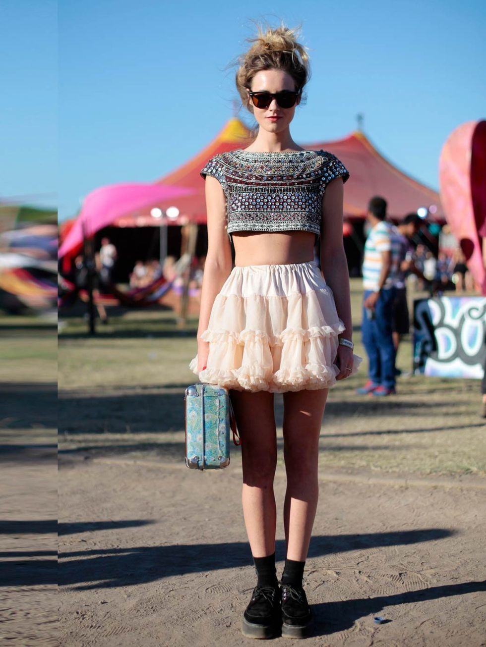 <p>Alice French is wearing a Zara top with American Apparel skirt, Doc Marten shoes, bag from Libertys and Ray Ban sunglasses. </p>