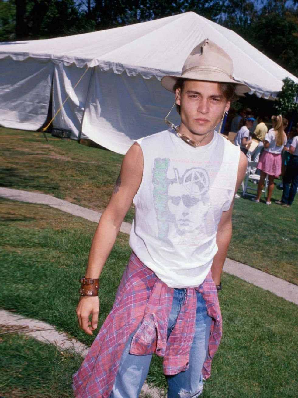 <p>Baby Depp rocks the nineties festival look. We dig it.</p>