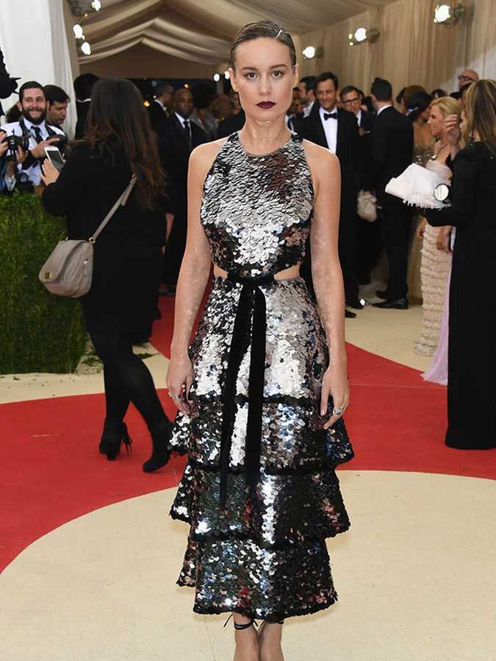 <p>With a nod to the 'Manus versus Machina' brief but done in a very non literal modern way, this metallic, sequinned dress by Proenza Schouler shines on Brie Larson.</p>