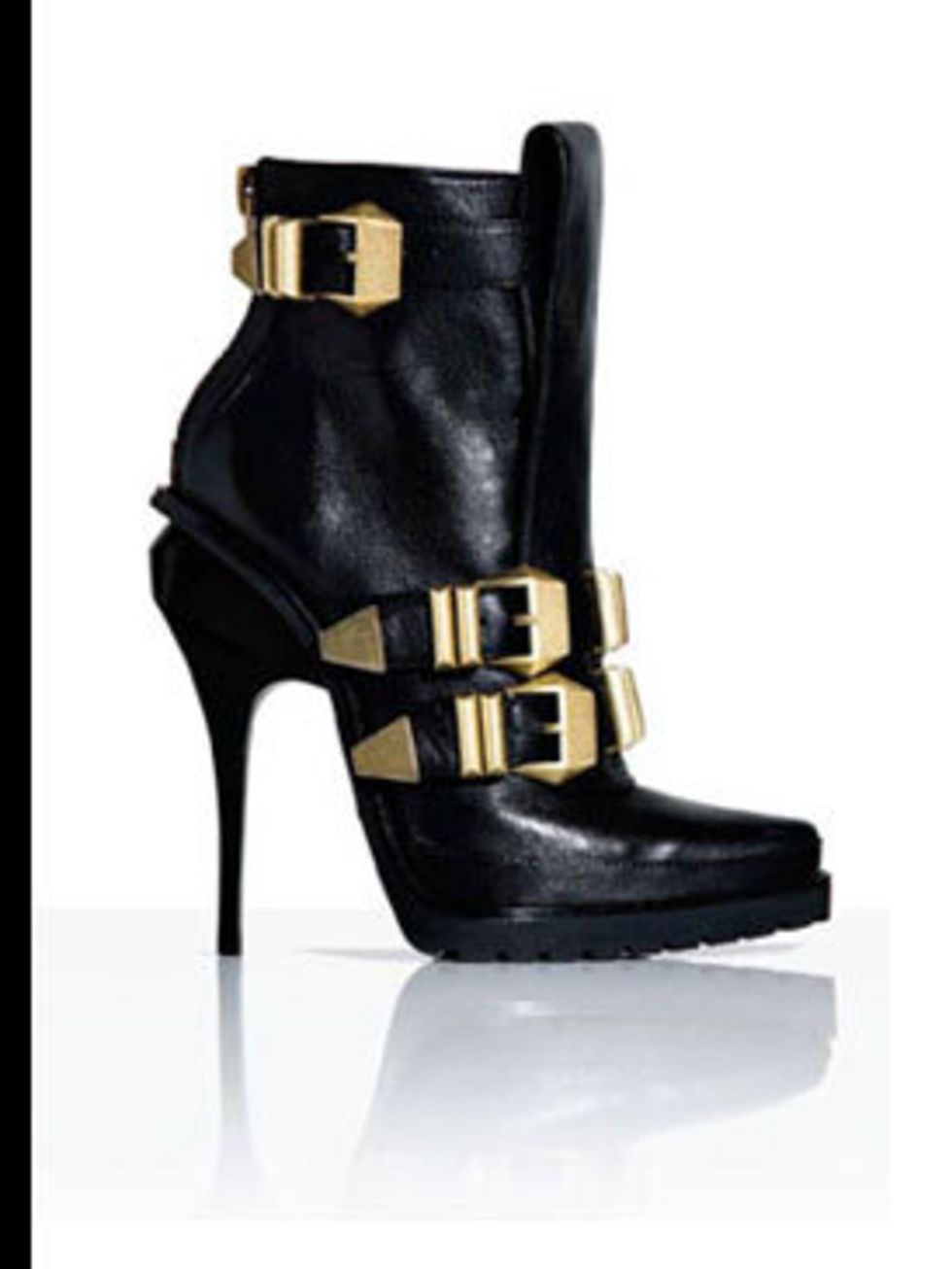 <p>Black ankle boots, £520, by Alexander Wang at Selfridges </p>