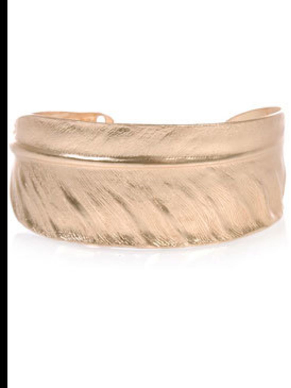 <p>Gold-plated feather cuff, £52, by Sowat at <a href="http://www.farfetch.com/shopping/women/search/item10016539.aspx">Farfetch</a></p>