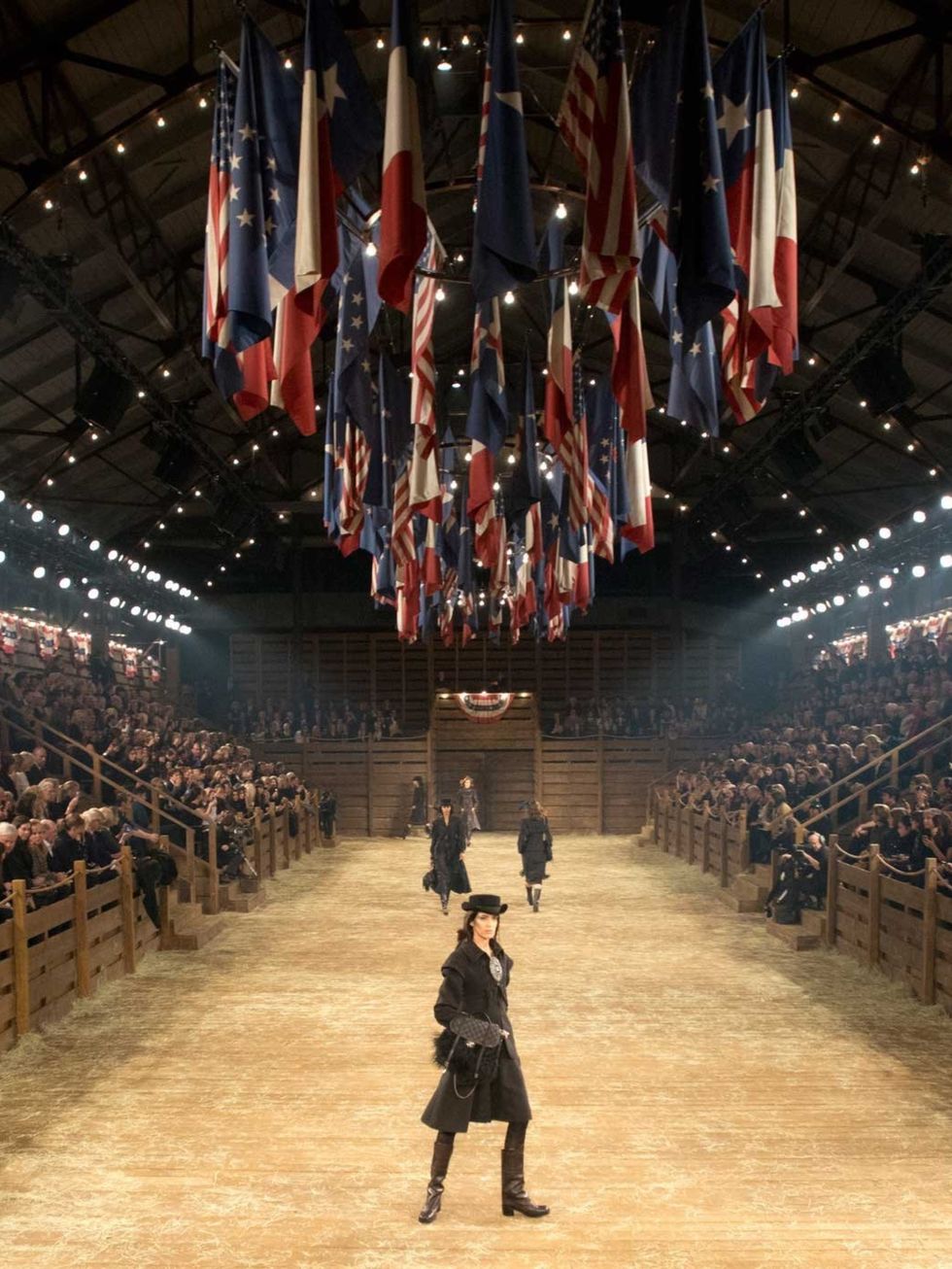 <p>Karl Lagerfeld and the Chanel team took their Metier d'Art show to Dallas, Texas last night. Fringing, feathers and cowboys on the catwalk? check. Celebrties sitting in vintage American cars? Check. A rodeo arena for a stage? Of course. Here's a look a