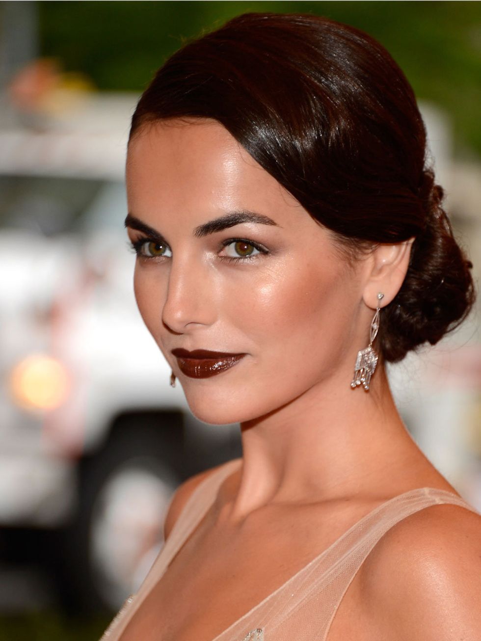 <p>Camilla Belle wearing her hair in a low bun at the 2012 Met Ball</p>