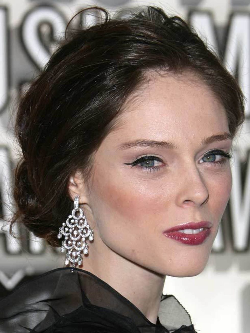<p>Coco Rocha has clearly been taking backstage beauty notes: she knows a slick of black liner is the quickest way to update her look. Oh and her berry lip is bang on trend too. Try Rimmel's Exaggerate Eye Liner, £4.99. </p>