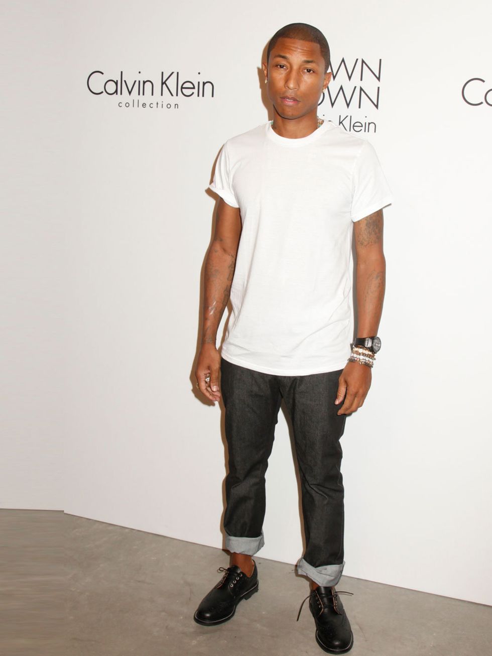 <p><a href="http://www.elleuk.com/star-style/celebrity-style-files/pharrell-williams-man-of-the-week">Pharrell Williams</a> at the Calvin Klein show after party, New York Fashion Week, September 2013. </p><p><em><a href="http://www.elleuk.com/catwalk">Lat
