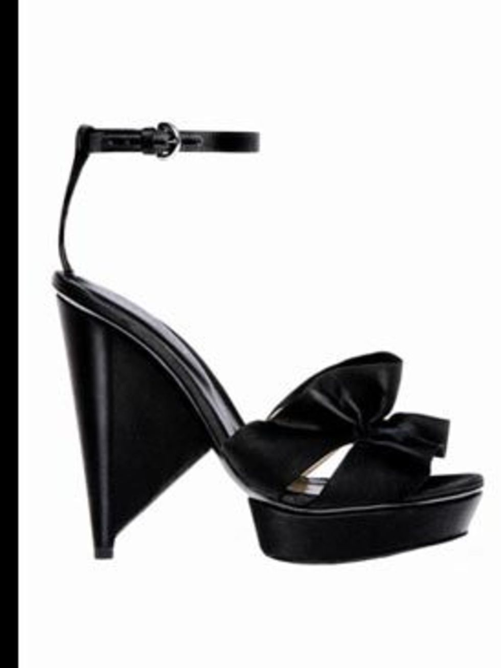 <p>Black ruffle sandals, £305, by Sergio Rossi, for stockists call 0207 811 5950</p>