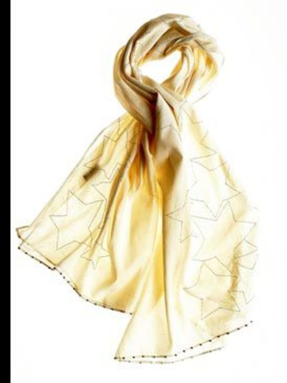 <p>Kara Pareo scarf, £61, by Antik Batik. For stockist details call 0845 094 4012</p>