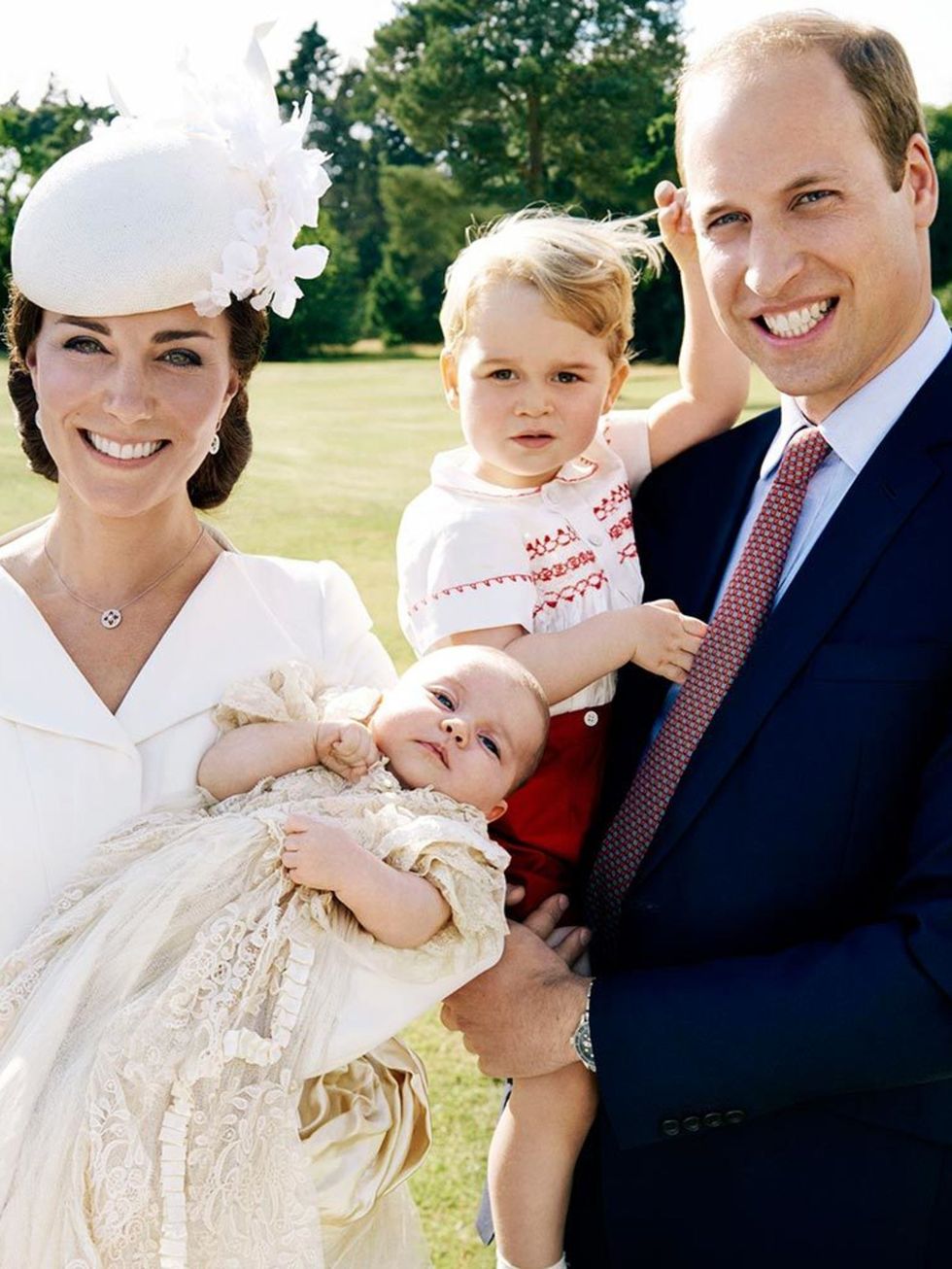 Kate, William and Charlotte in an official portrait by Mario Testino.