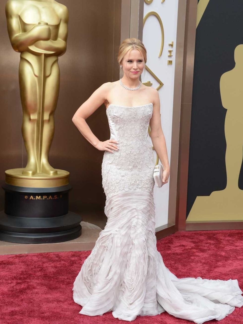 <p>Kristin Bell wears Roberto Cavalli to attend the Academy Awards 2014</p>