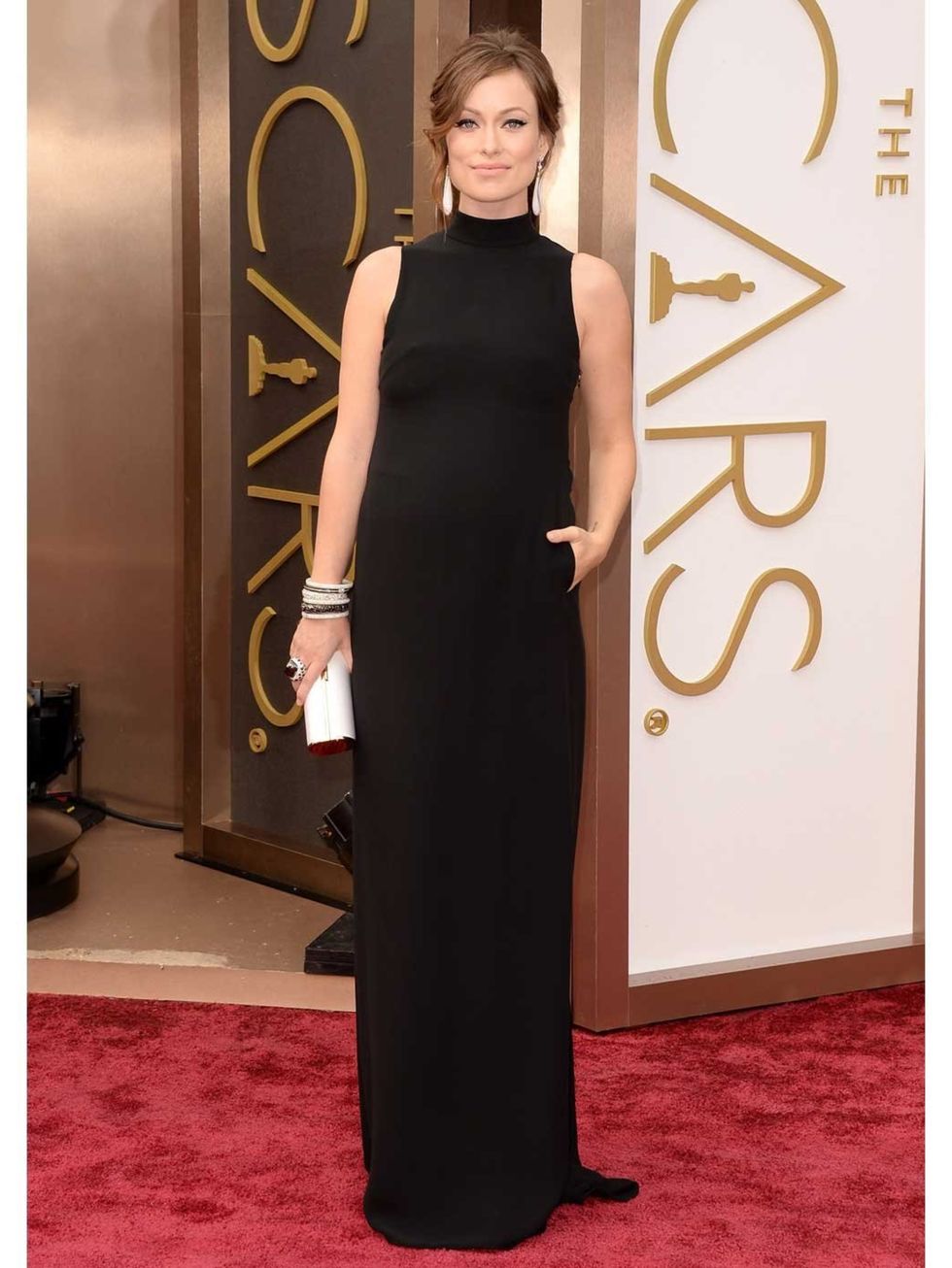 <p>Olivia Wilde wears <a href="http://www.elleuk.com/catwalk/designer-a-z/valentino/couture-ss-2014" style="color: rgb(11, 78, 122); font-family: Arial, Helvetica, sans-serif; line-height: 16px;" target="_blank">Valentino</a> to the Academy Awards 2014</p