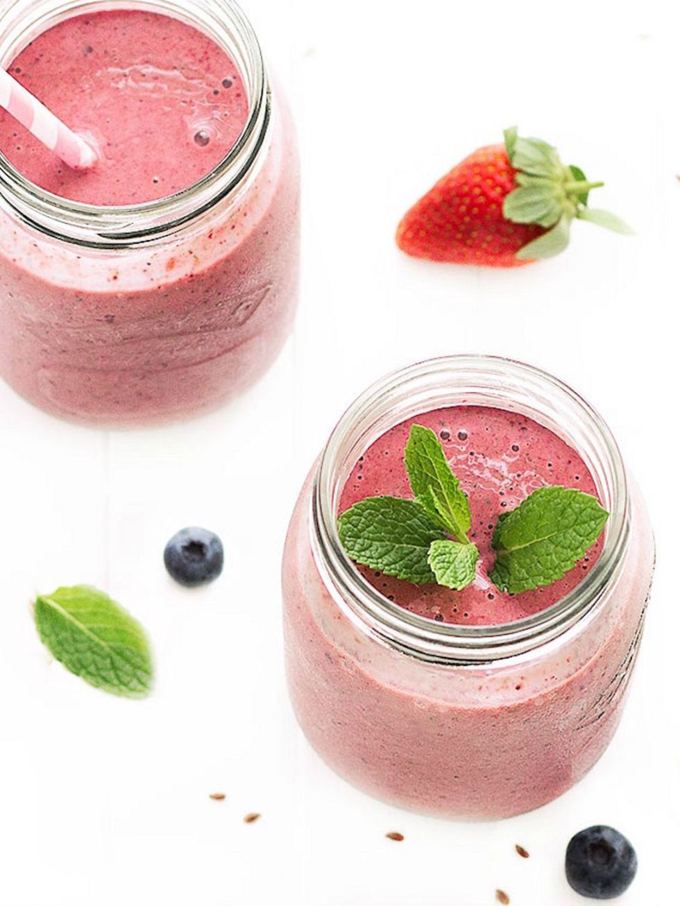 <p><strong>2.8K Shares</strong>. Berries are a source of anti-oxidants and flax seeds are a great source of essential fatty acids, so this berry, flax seed, yogurt and kale smoothie from <a href="http://aseasyasapplepie.com/glowing-skin-berry-smoothie/">E