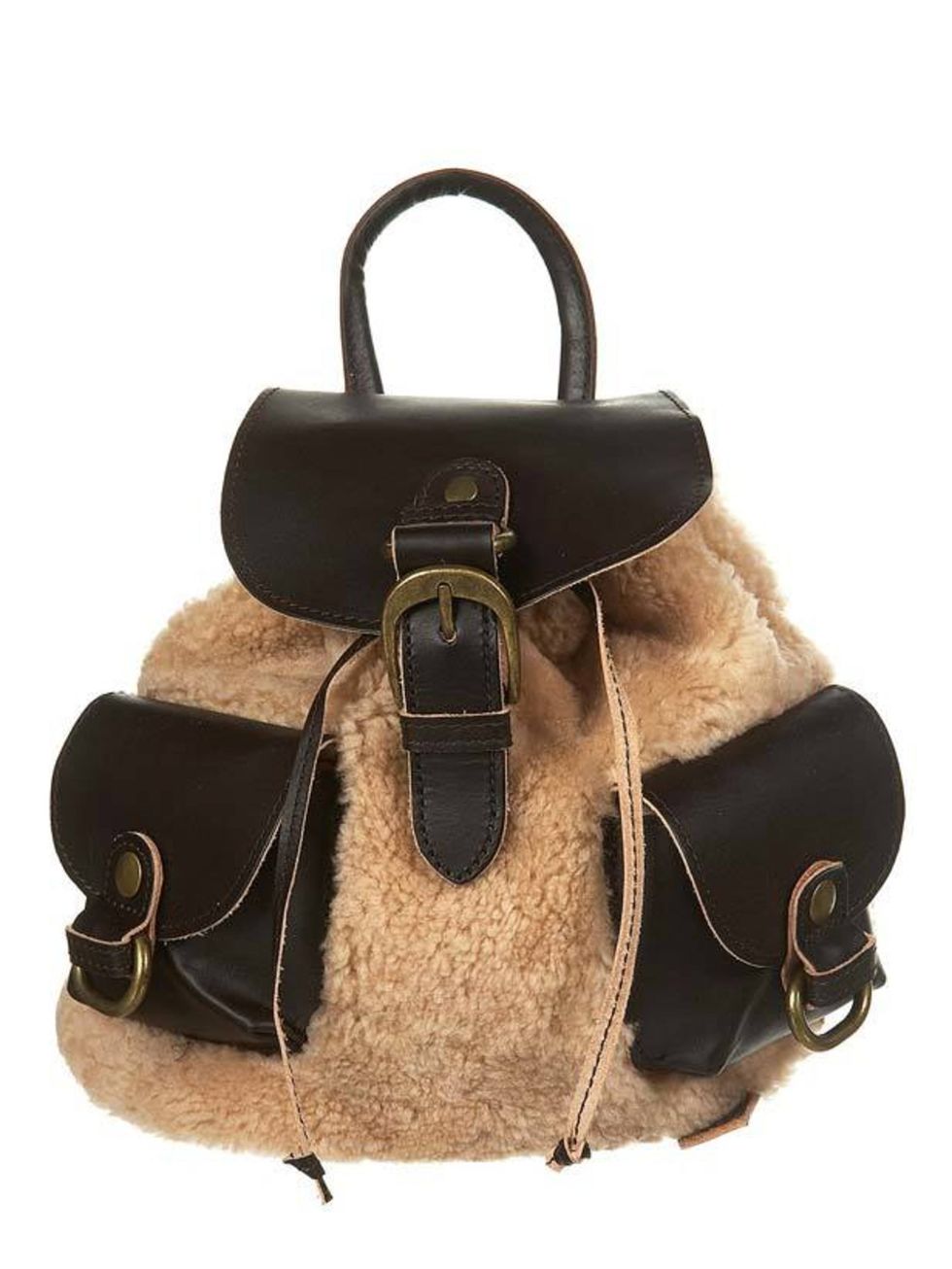 <p>Satisfy your hunger for shearling with Topshops sheepskin rucksack. A huge trend for a/w and a practical piece that will look great with an aviator jacket. <a href="Small%20Sheepskin%20Rucksack%20">Topshop</a> rucksack, £75 </p>
