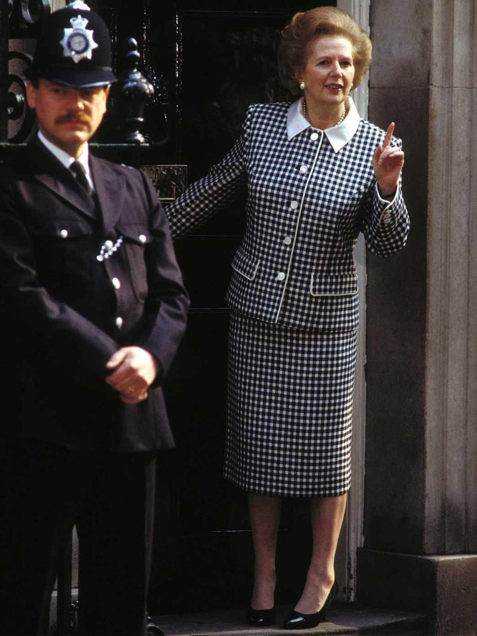 <p>Power Suits A boxy skirt suit was the Iron Lady's uniform - the perfect fusion of femininity and forcefulness.</p><p>Margaret Thatcher, gestures outside 10 Downing Street May, 1989.</p>