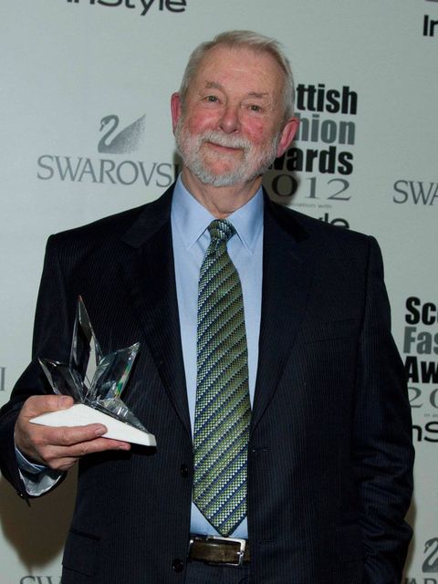 <p>Author, fashion journalist and founder of Fashion Fringe Colin McDowell with his Fashion Ambassador Award</p>
