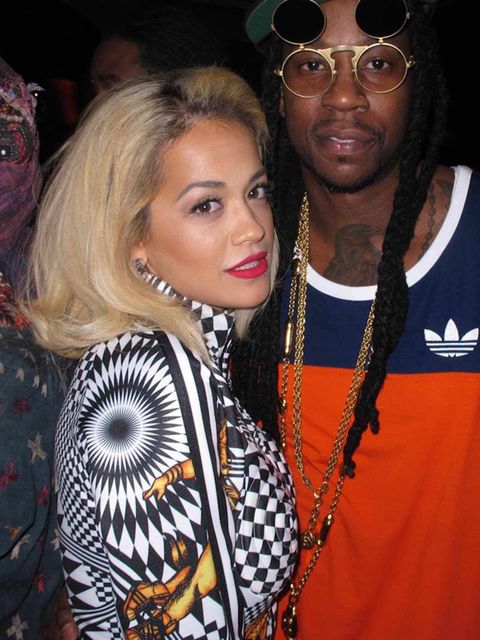 <p><a href="http://www.elleuk.com/star-style/celebrity-style-files/rita-ora-s-best-looks-from-hip-hop-throwback-90s-high-street-to-red-carpet-glamourous-looks">Rita Ora</a> and 2Chainz at the Jeremy Scott Party at the Frank Sinatra House, Palm Springs dur