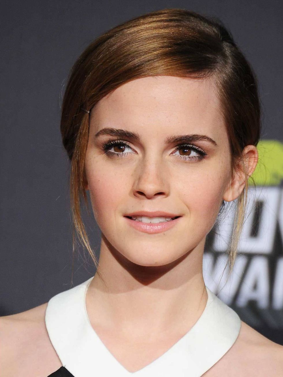 <p><a href="http://www.elleuk.com/star-style/celebrity-style-files/emma-watson">Emma Watson,</a> who took home the award for Trailblazer, opted for pretty, classic make-up  employing some expert tricks along the way like applying white eyeliner in her wa