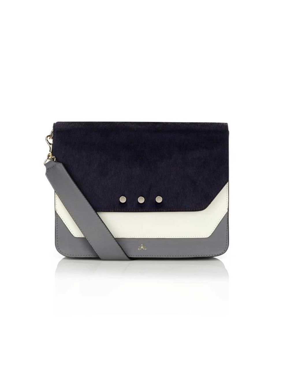 <p>This elegant little number doubles as both clutch and satchel, whether you're out for a glass of wine or running errands (not that we're saying that the two are mutually exclusive - wine-fuelled errand running is a great example of skilled multitasking