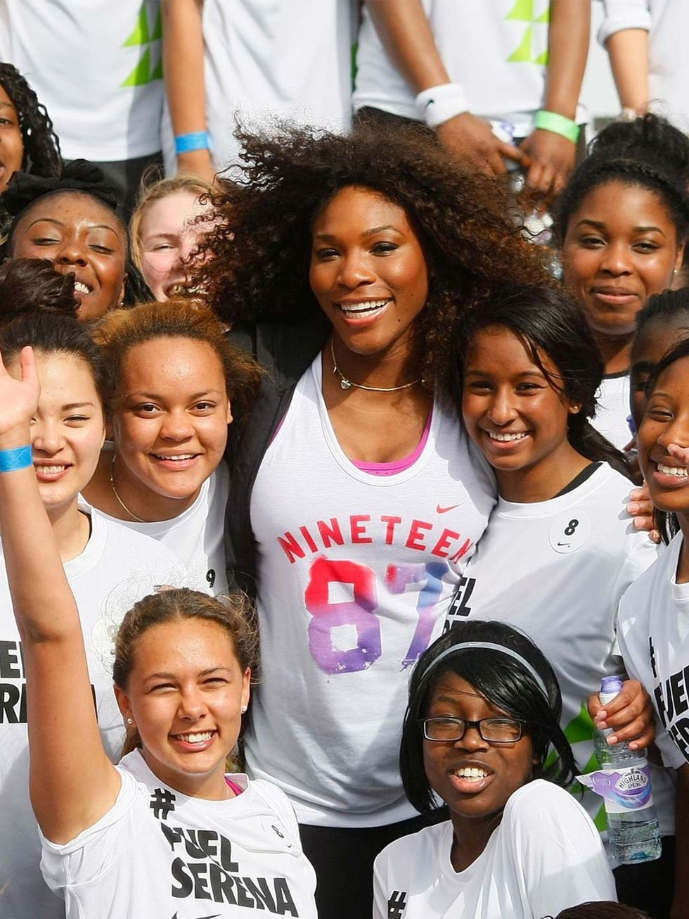 <p>Serena Williams with Nike Training Club participants</p>