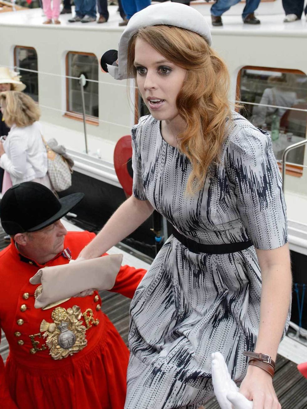 <p>Princess Beatrice in a Suzannah dress, <a href="http://www.elleuk.com/catwalk/designer-a-z/marni/autumn-winter-2012">Marni</a> coat and Stephen Jones hat on the Royal Jubilee flotilla during The Queen's Diamond Jubilee celebrations</p>