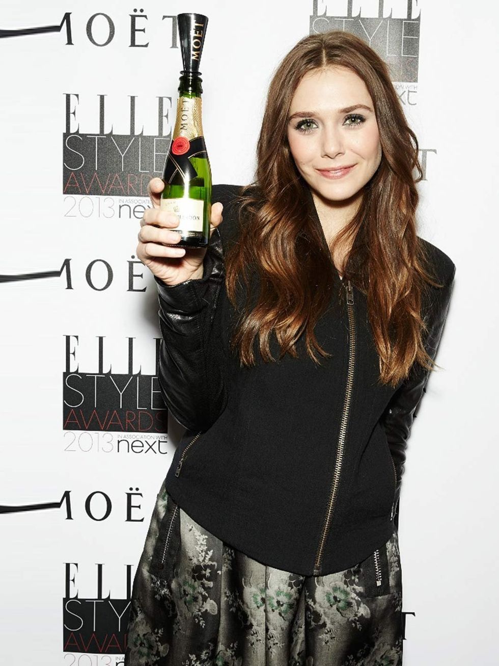 <p>Elizabeth Olsen's charity is yet to be decided.</p>