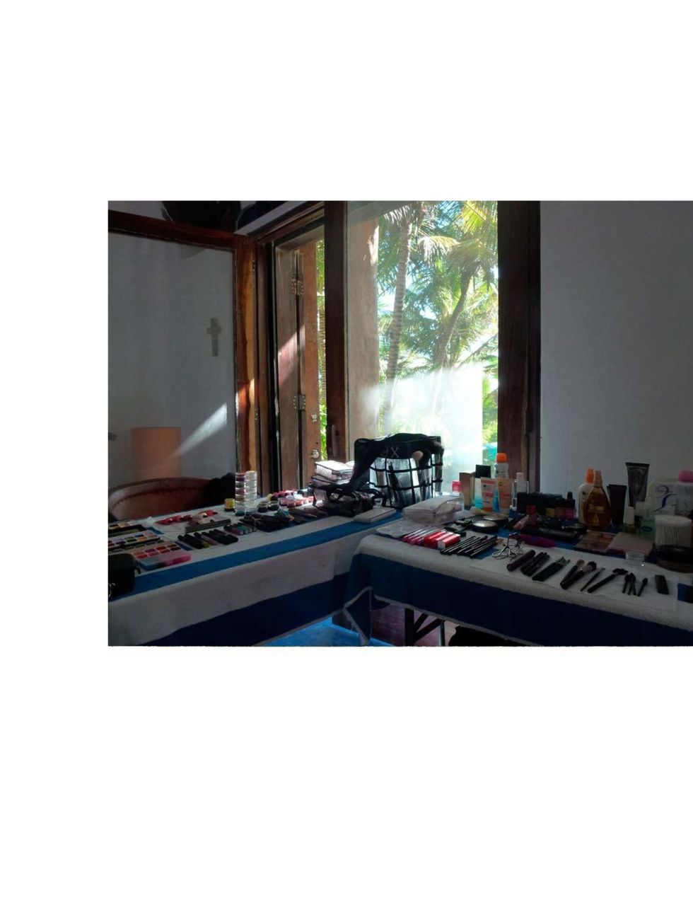 <p>Make-up Artist Sharon Dowsett's table is set up overlooking the ocean.</p>