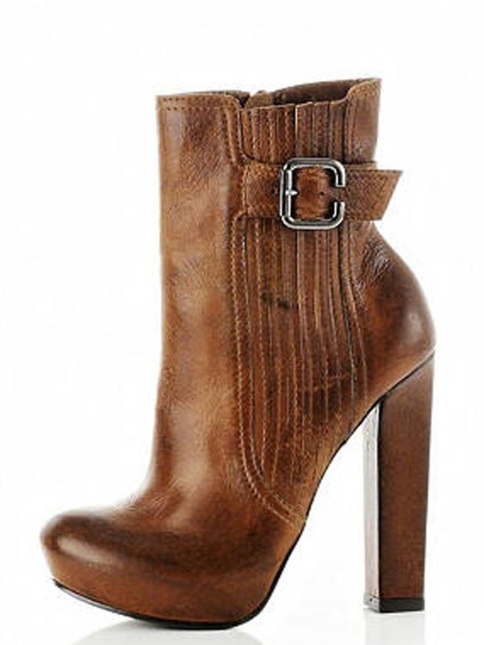 <p>Cool, sky high and a little bit Wang, these ankle boots are sure to sell out. <a href="http://www.riverisland.com/Online/women/shoes--boots/boots/brownpanelledankleboots-596518">River Island</a> leather ankle boots, £94.99 </p>