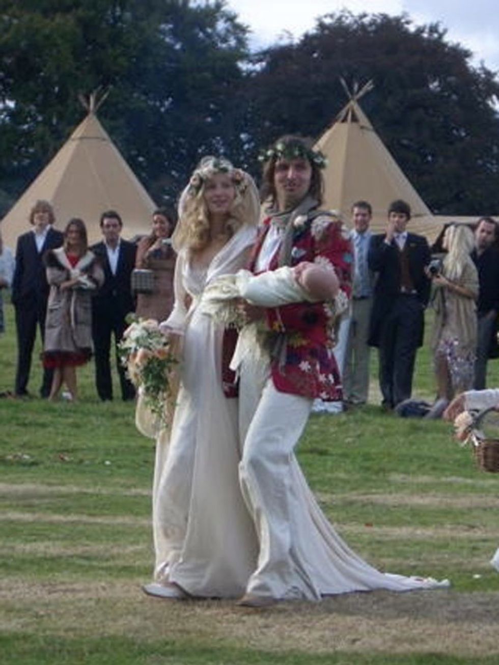 <p>Savannah Miller wears Jan Marie von Giebelhausen at her wedding in Devon, September 2005</p>