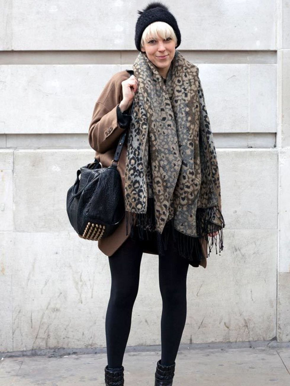 <p>Photo by Silvia Olsen.Anna, 31, Buyer. Topshop jacket, Urban Outfitters hat and scarf, Alexander Wang bag.</p>