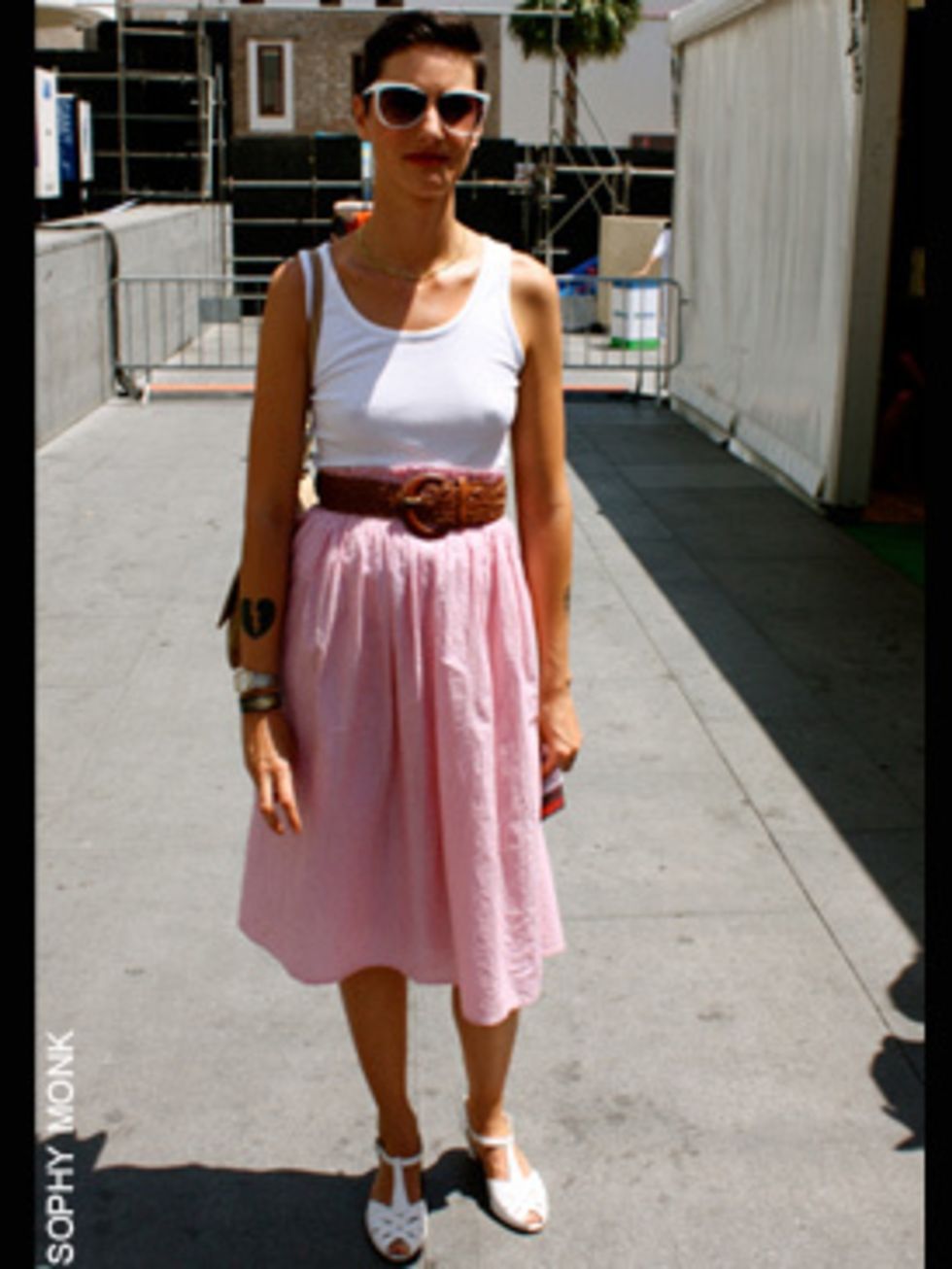 <p>Alejandra, 28, graphic designer wearing vest, skirt, belt and jewellery all vintage</p>