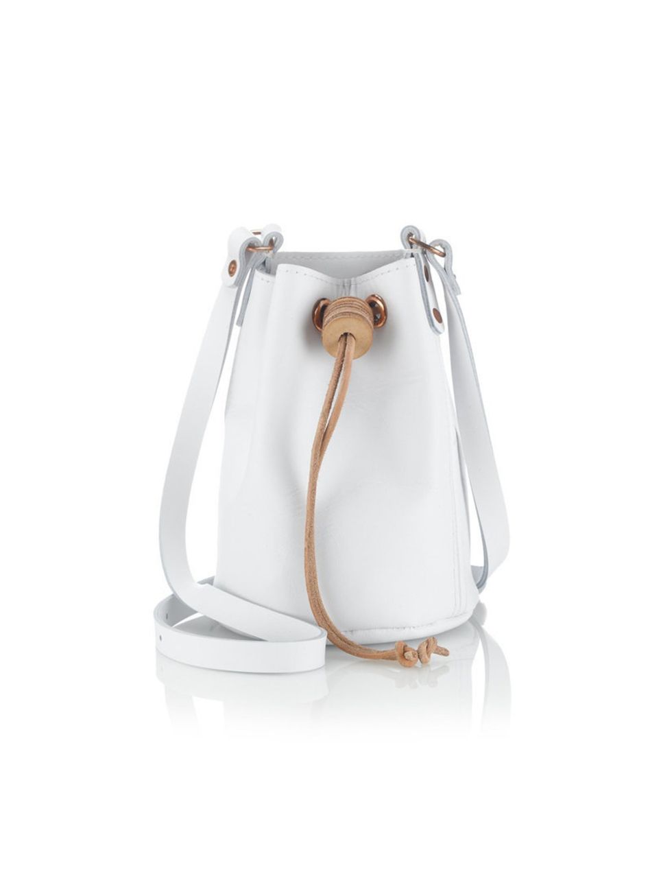 <p>Think of this as a grown-up beach bucket. Just don't fill it with sand.</p><p>Alfie Douglas bucket bag, £140, from <a href="http://www.avenue32.com/whats-new/white-alfie-eight-mini-duffle-bag-19501.html">Avenue32.com</a></p>